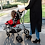 Woman pushing her little girl in Trotter Stroller Woman pushing her little girl in Trotter Stroller