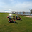 Recreational Scooter driving on grass showing charge level Recreational Scooter driving on grass showing charge level